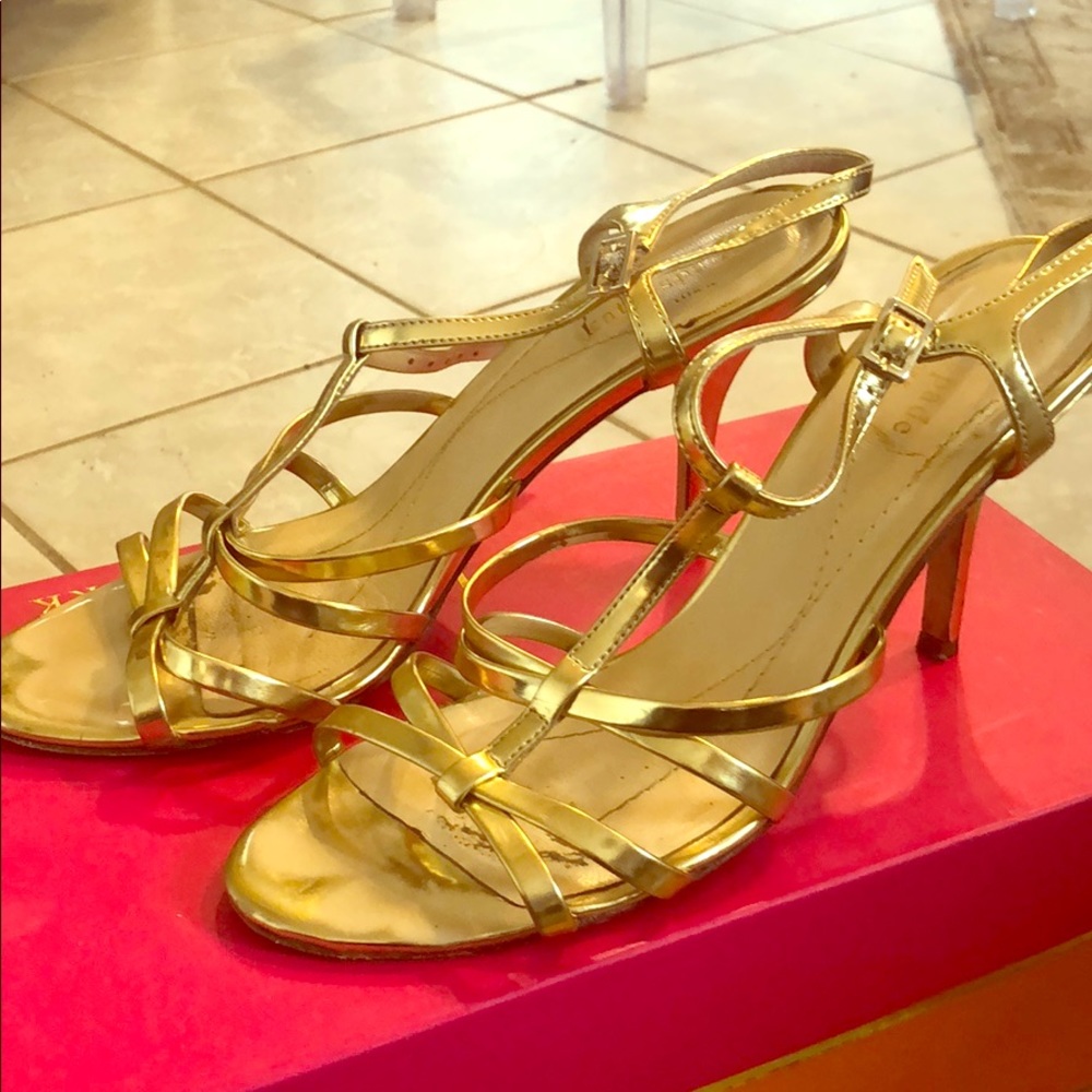 Kate Spade Gold metallic strappy heel.